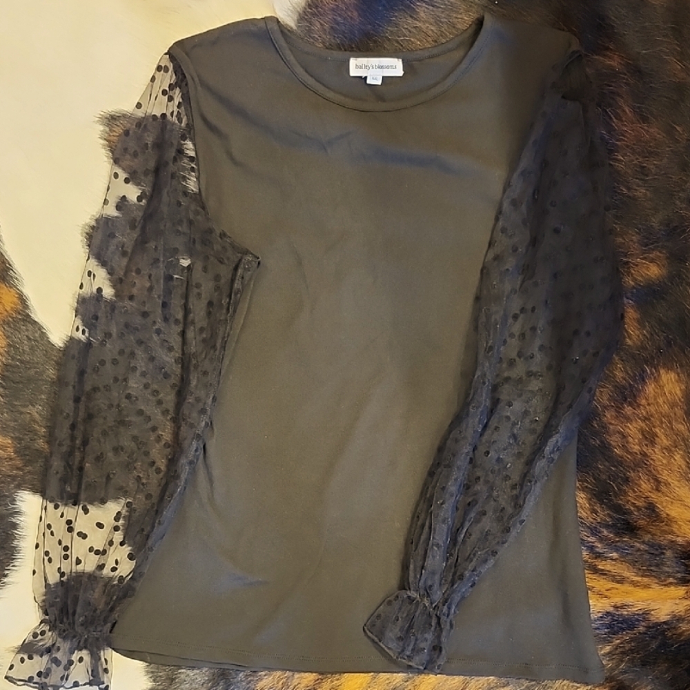 Elegant Black Blouse with Sheer Polka Dot Sleeves